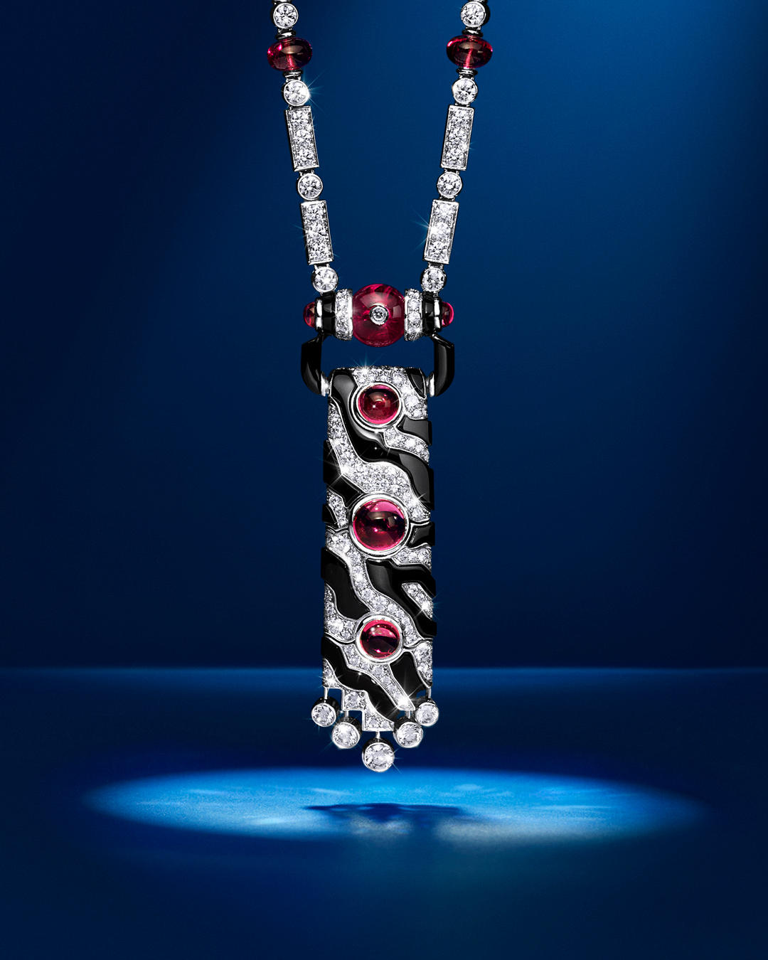 image  1 Cartier Official - A chromatic palette of onyx and rubellite gives a powerful rhythm to this #Cartie