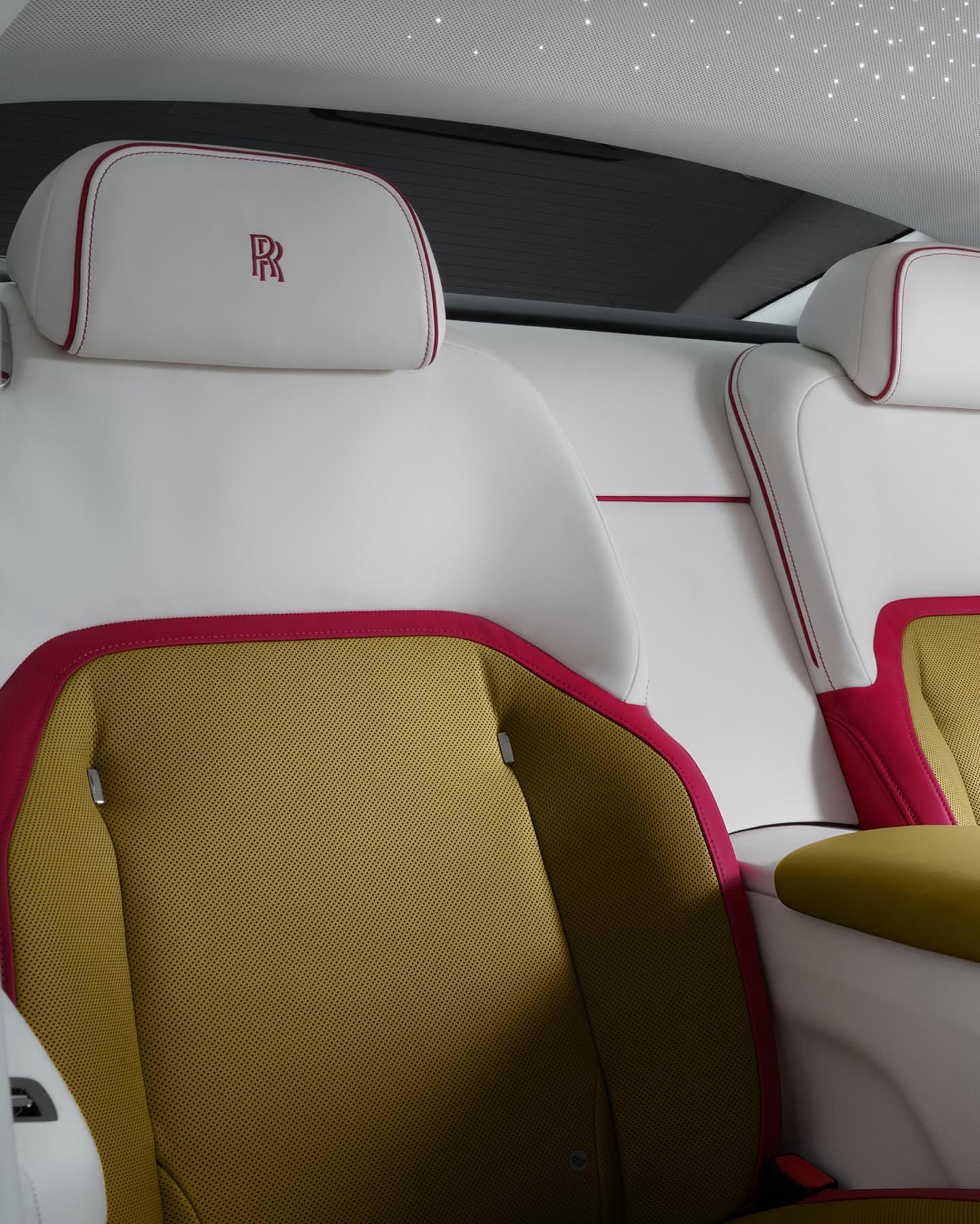 image  1 Rolls-Royce Motor Cars - Spectre's continuous rear seat wraps itself around the passenger, cocooning